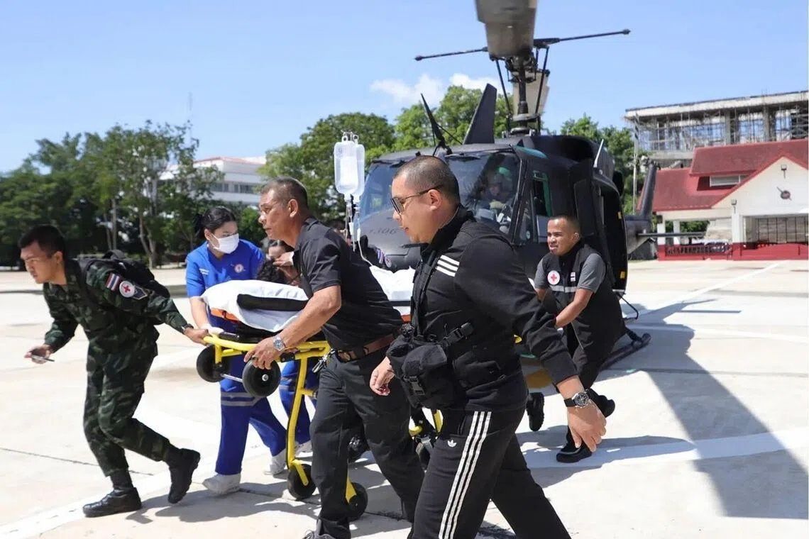 Twin bombings in Thailand's south injure 11 police officers as insurgent violence persists