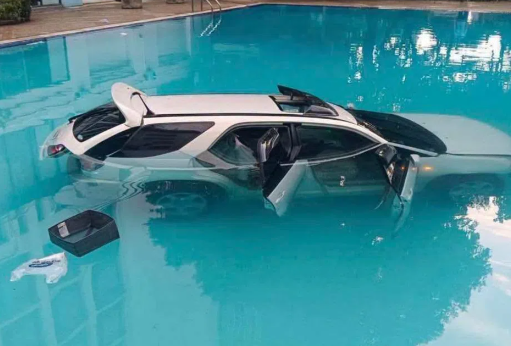 Family Row Over Condo Rent Ends in Pool When Thai Man Drives SUV Into University
