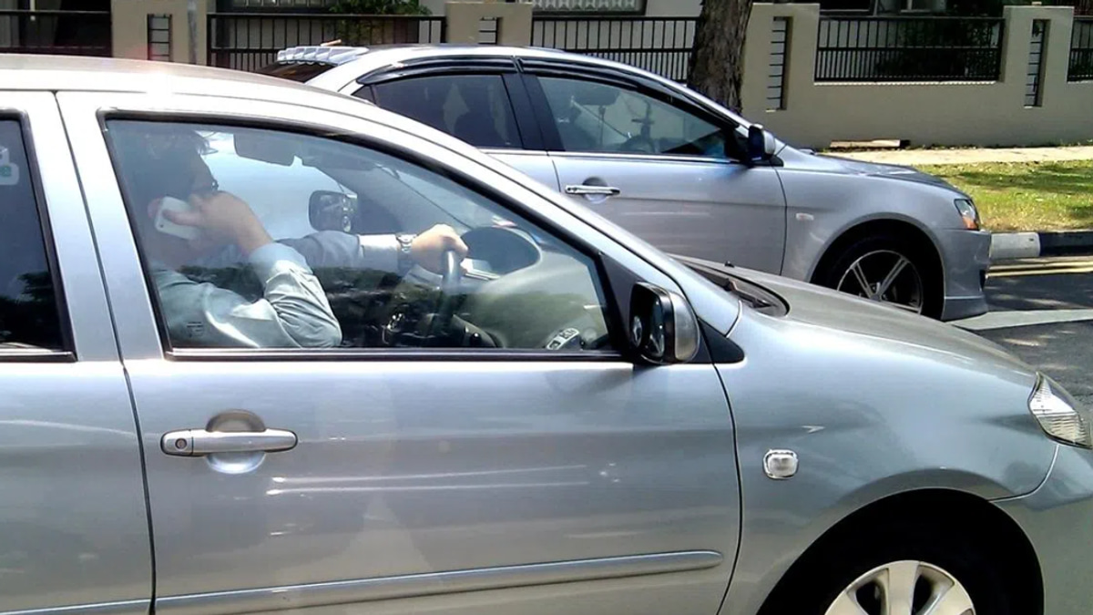 Singapore tightens mobile phone and dangerous driving laws with jail and hefty fines