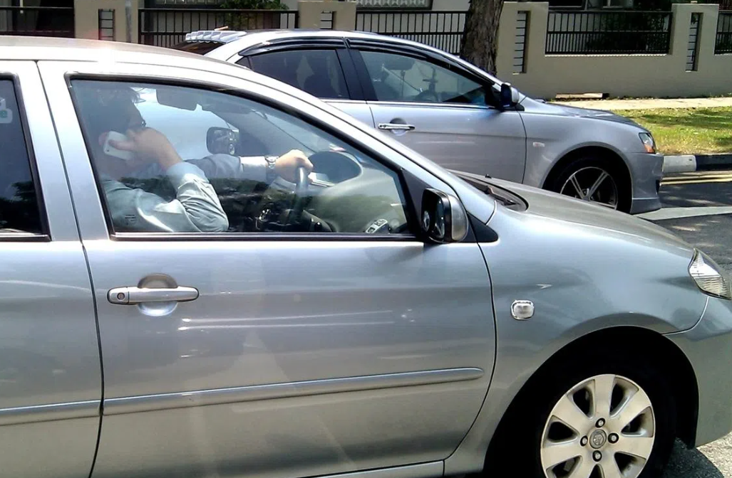Singapore tightens mobile phone and dangerous driving laws with jail and hefty fines