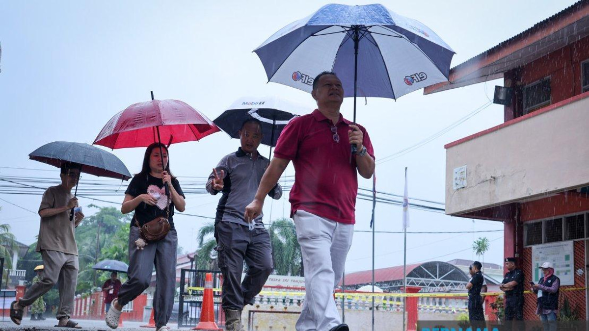 Johor State Election Proceeds Smoothly Despite Heavy Rain in Muar